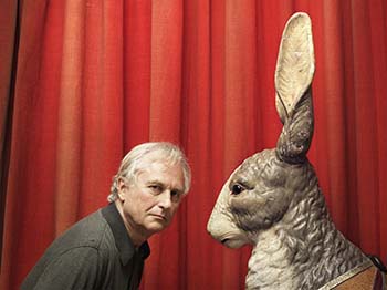 Dr. Richard Dawkins with a statue of a rabbit